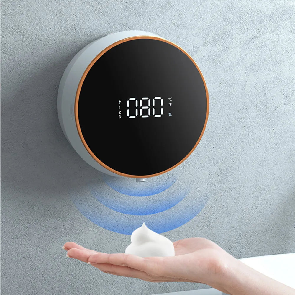 Black automatic sensing foam dispenser with USB charging port mounted on bathroom wall