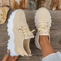 Women's Flyknit mesh casual sports shoes in a flat heel style with a lace-up front.