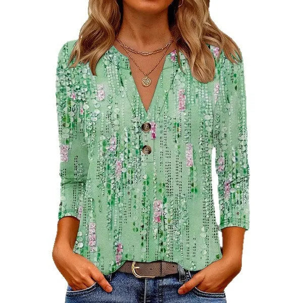 Women's loose-fit V-neck top with a 3D pattern, shown in one of its available colours.