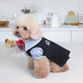 Dark grey teddy fleece dog jacket on a hanger, showing soft texture and casual fit.