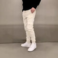Men's casual baggy trousers with elastic waistband and patch pockets in light blue colour