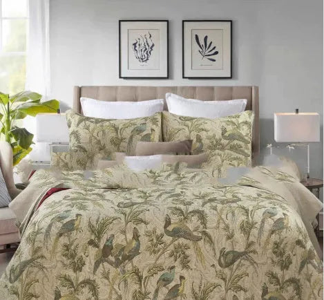 Blue American style floral bird quilted cotton bedspread set on a bed