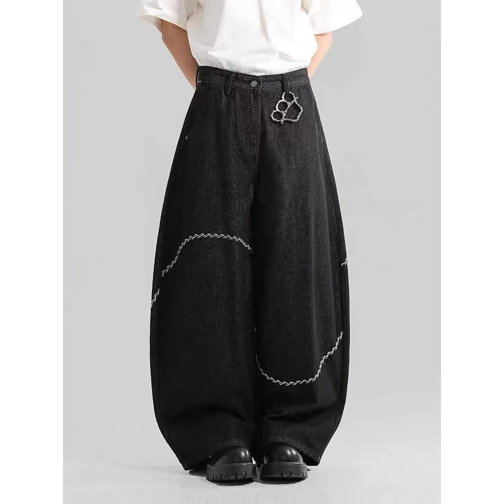 Black straight-leg denim trousers with mid-waist design and zip placket closure