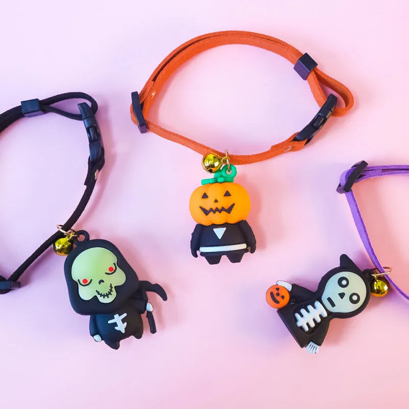 Halloween dog collar with luminous pumpkin man, brat and skull designs in adjustable polyester construction