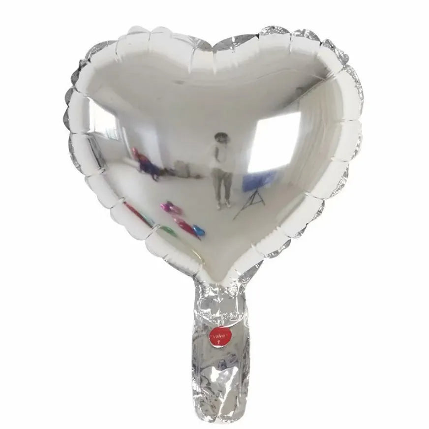 Five peach heart shaped aluminum foil balloons in metallic colours for party decoration