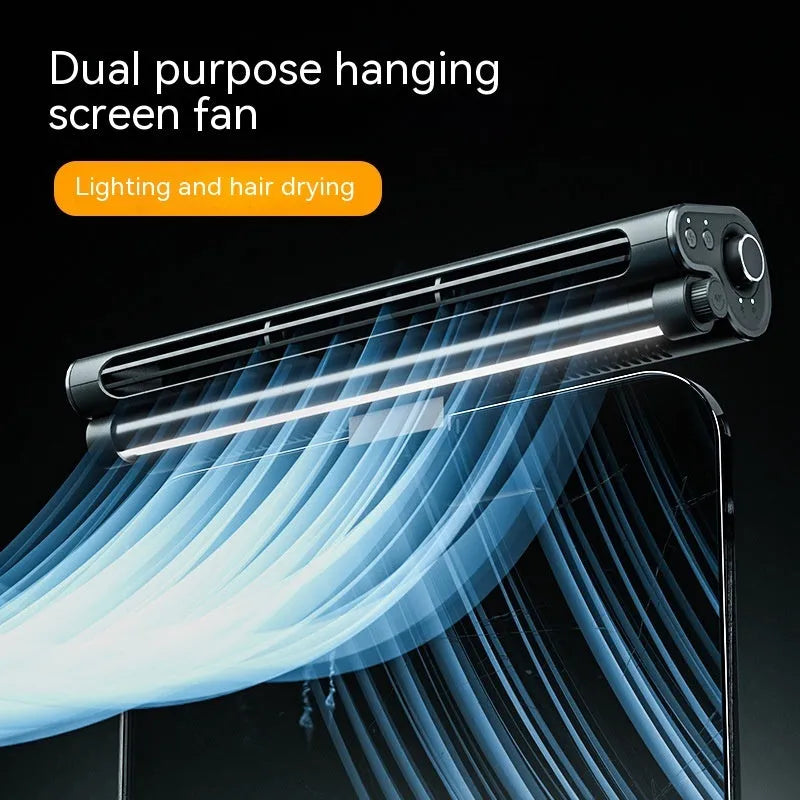 Black USB-powered bladeless fan with a clip, mounted on a laptop screen, showing its integrated light.