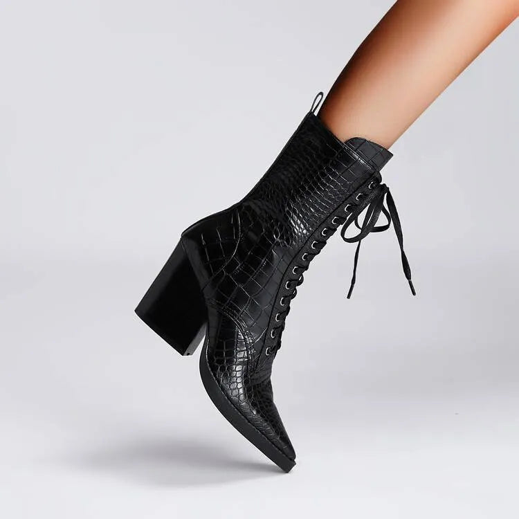 Women's dark brown pointed toe boots with a chunky heel, retro stone pattern, and side zipper.