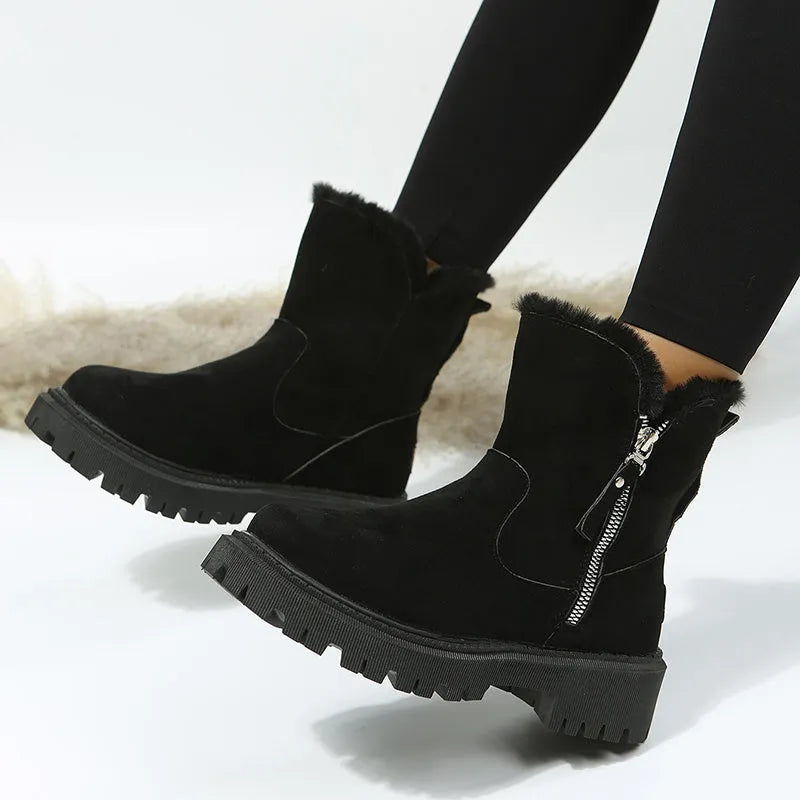 Black women's high-top snow boots with faux suede upper, side zipper, and thick plush lining.