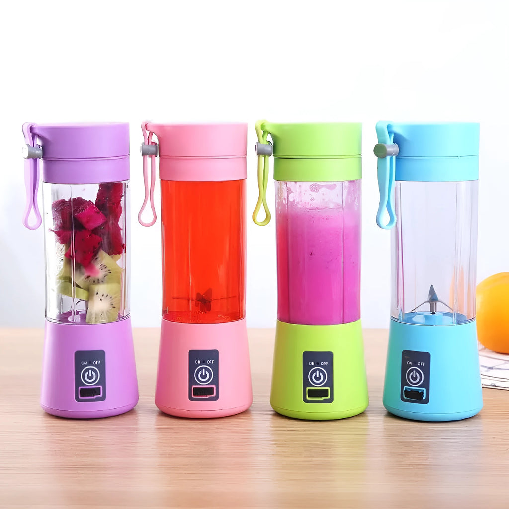 Pink portable USB rechargeable blender with 380ml cup on a table next to fruits.