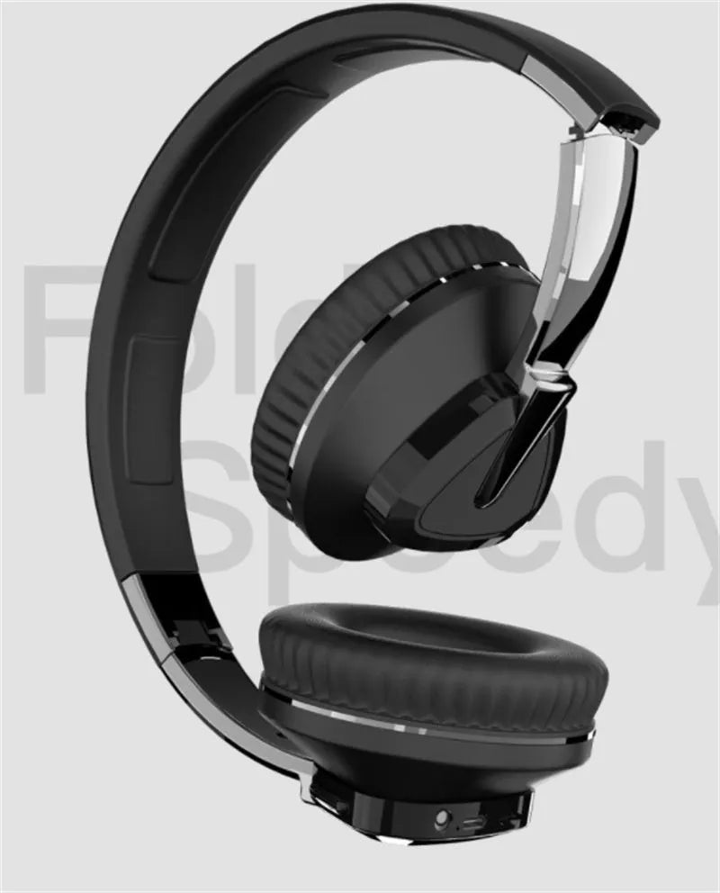 Wireless Bluetooth over-ear headphones in black colour with all-inclusive ear design showing AUX port and control buttons