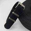 Nylon integrated watch strap in military colours showing integrated design without separate buckles