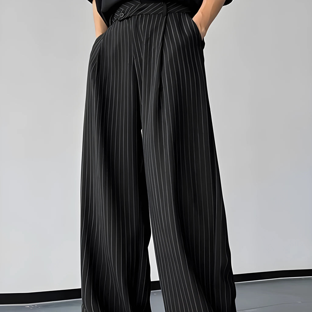 Men's black vertical striped pleated casual trousers showing front design and fabric texture