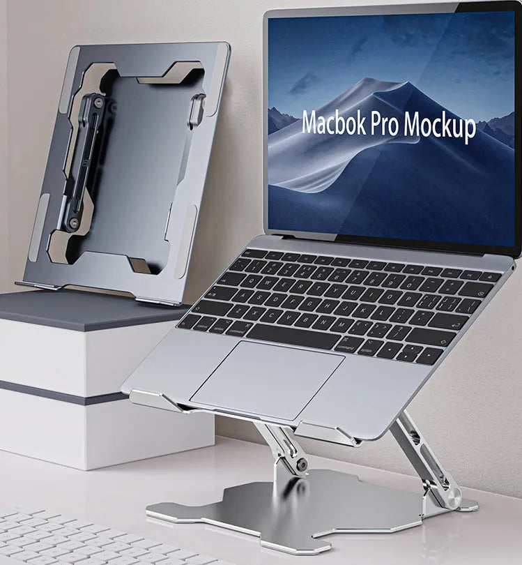 Grey aluminium adjustable laptop stand in folded position showing hollow design and silicone pads