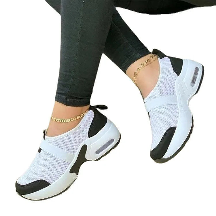 Women's white mesh flat sneakers with round toe and non-slip rubber sole