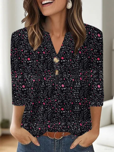 Women's loose-fit V-neck top with a 3D pattern, shown in one of its available colours.