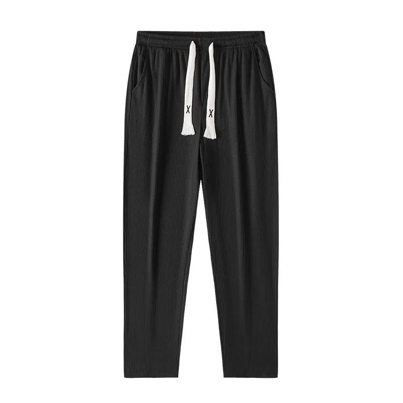 Men's cropped casual loose tapered pants in black, 100% polyester, mid waist, cropped length, sizes M to 4XL.