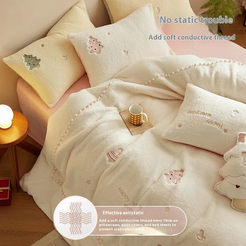 Winter milk fibre bedding four-piece set with green Christmas tree reactive print on a quilt cover and pillowcase.