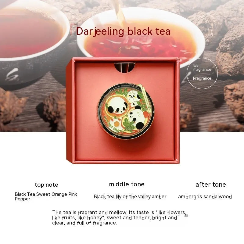 Panda hot pot shaped car air vent fragrance clip on a car vent with diatomaceous earth scent tablets.