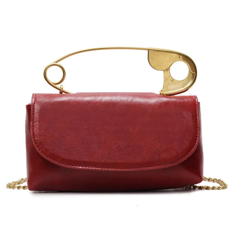 Creative paper clip shoulder handbag in horizontal square shape with street trend style