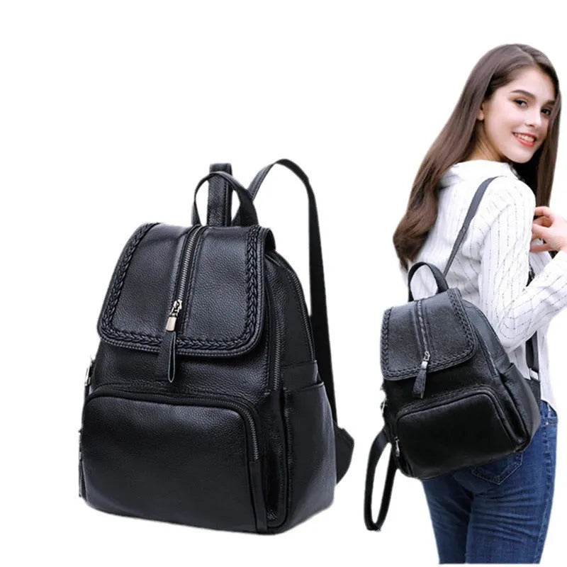 Blue genuine leather street trend women's backpack showing external sandwich pocket and zipper.