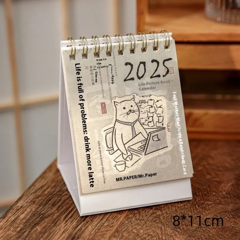 Coffee Coffee mini desk calendar set showing four 2025 paper calendars with different themes for daily inspiration