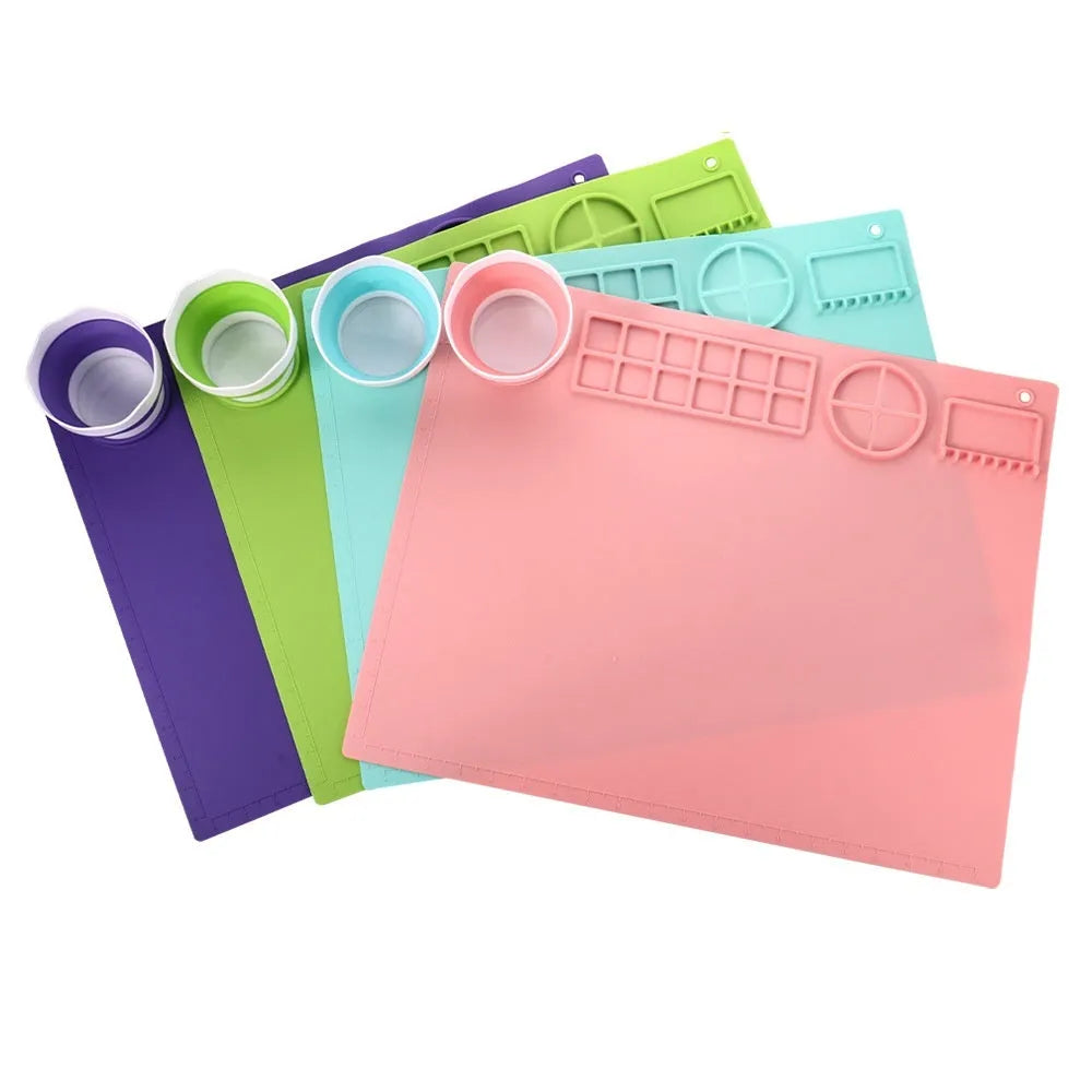 Silicone double bowl painting mat in green, measuring 50cm by 40cm, for watercolour and graffiti art.