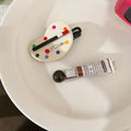Pair of creative duckbill clip barrettes for women in plastic, available in green, red, and coffee colour