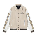 Women's bone stitch embroidered wool jacket in apricot colour, showing front design.
