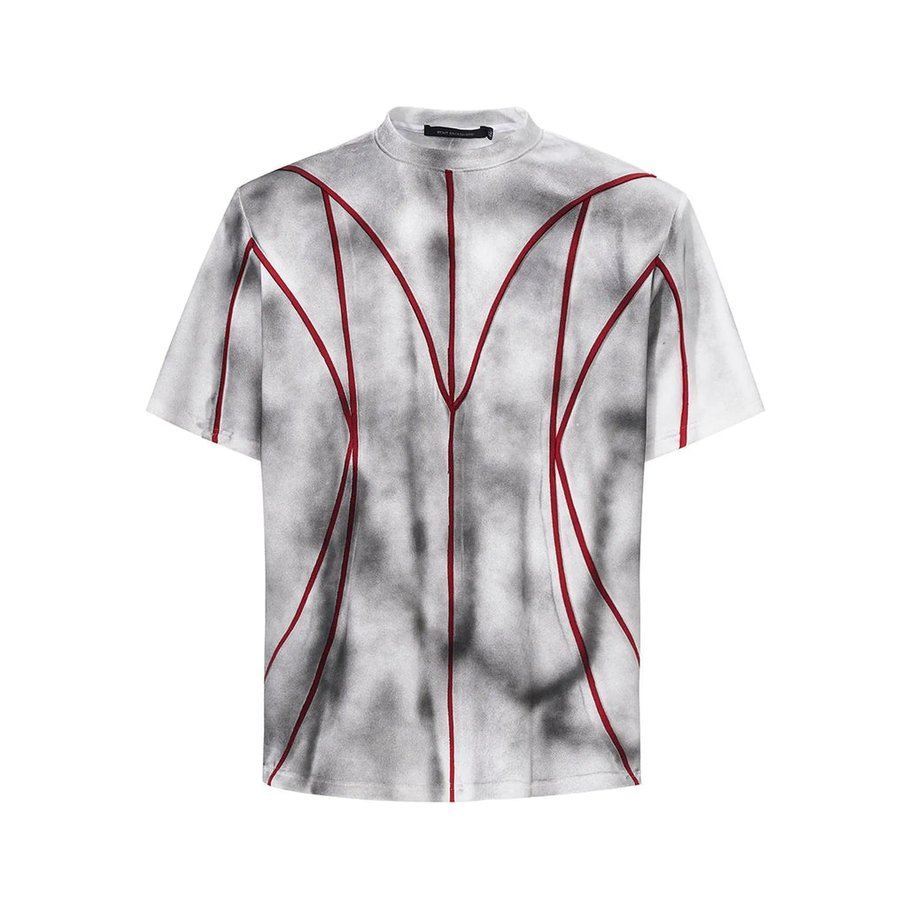 Padded shoulder short sleeve T-shirt with three-dimensional line patchwork detail on a round neck.