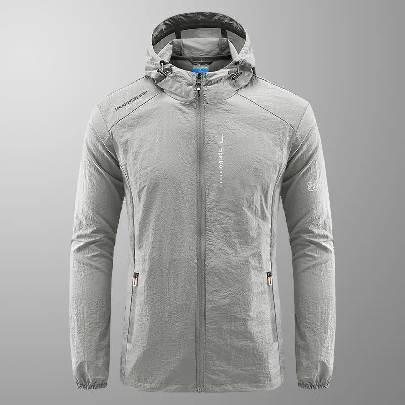 Men's loose-fit light grey nylon hooded jacket for summer outdoor wear.