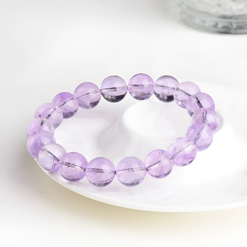 Lavender amethyst bracelet with geometric round beads showing water ripple design in cream body or transparent colour options