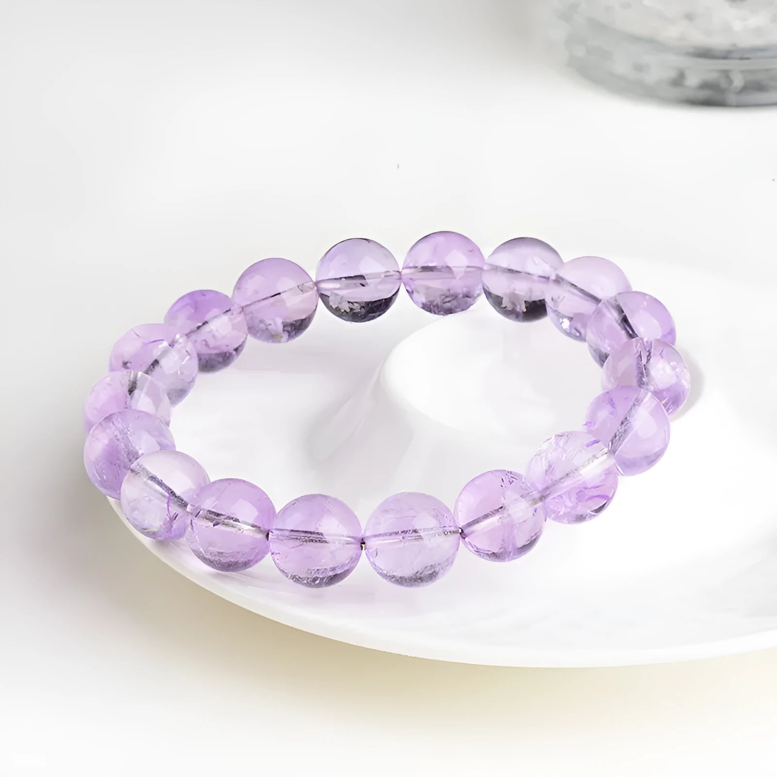 Lavender amethyst bracelet with geometric round beads showing water ripple design in cream body or transparent colour options
