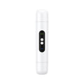 Pink and white portable electric armpit hair trimmer with USB charging cable on white background