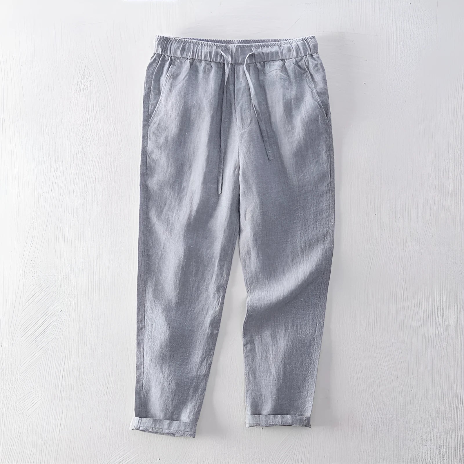 Men's linen straight leg trousers in mid waist design showing white, khaki, light grey and dark grey colour options