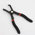 Red interior round nail removal pliers with PVC handles and adjustable jaws.