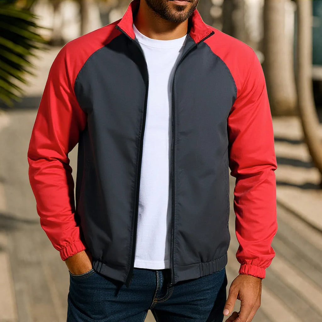 Man wearing a green stand collar casual jacket with raglan sleeves.
