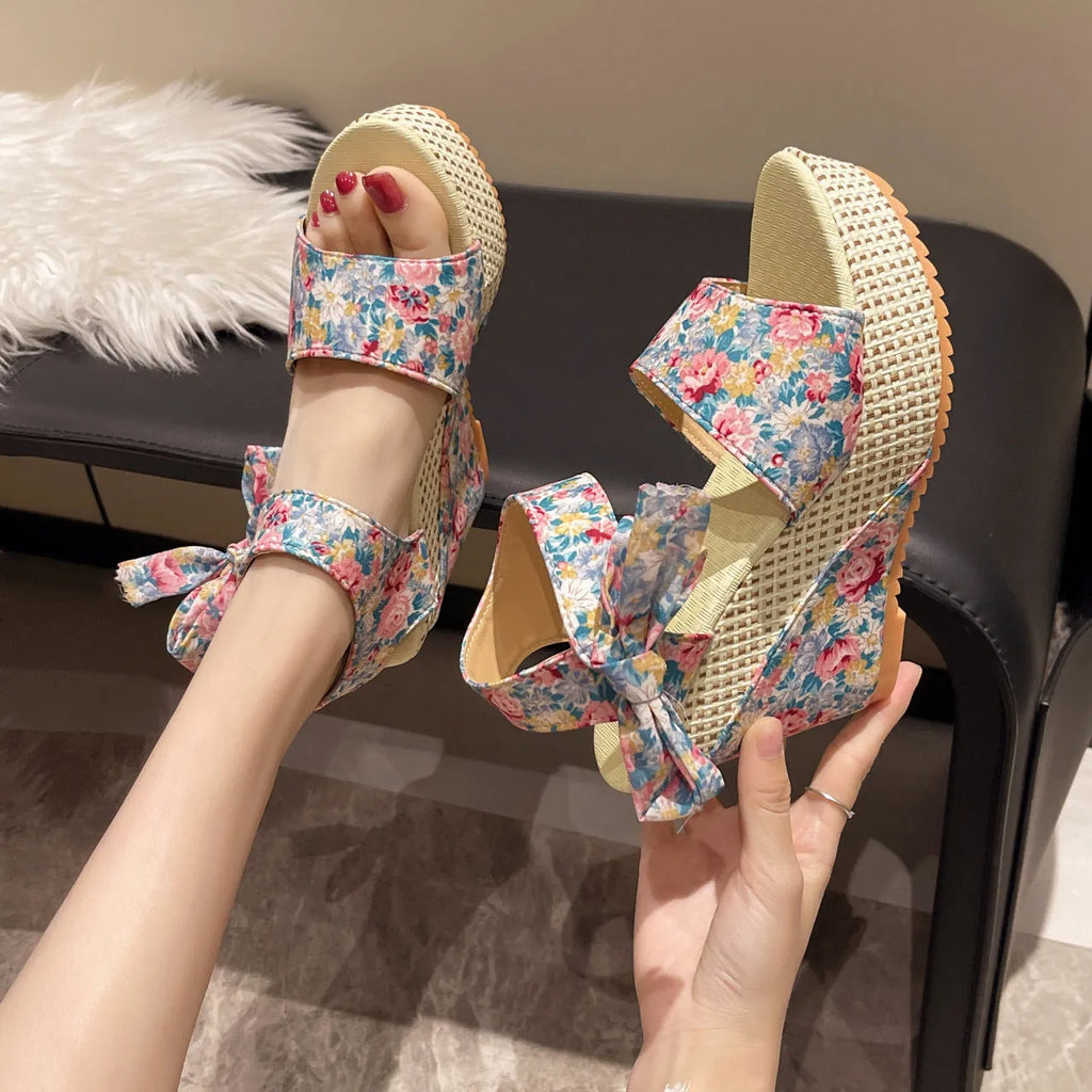 Women's wedge sandals with floral pattern cloth upper and adjustable ankle strap
