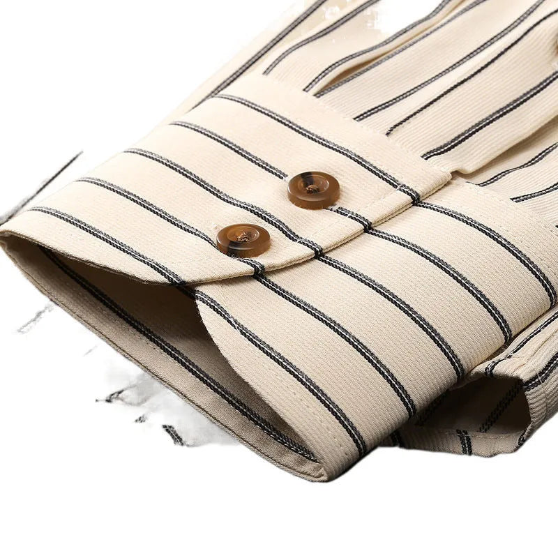 Coffee coloured striped men's long-sleeved shirt with a slim fit on a hanger.