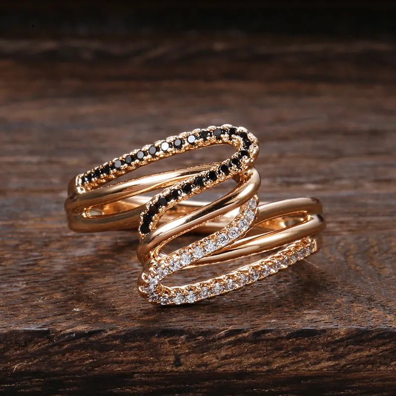 Close-up of a women's micro-inlaid zircon fashion ring in WK2230 colour on a copper base.