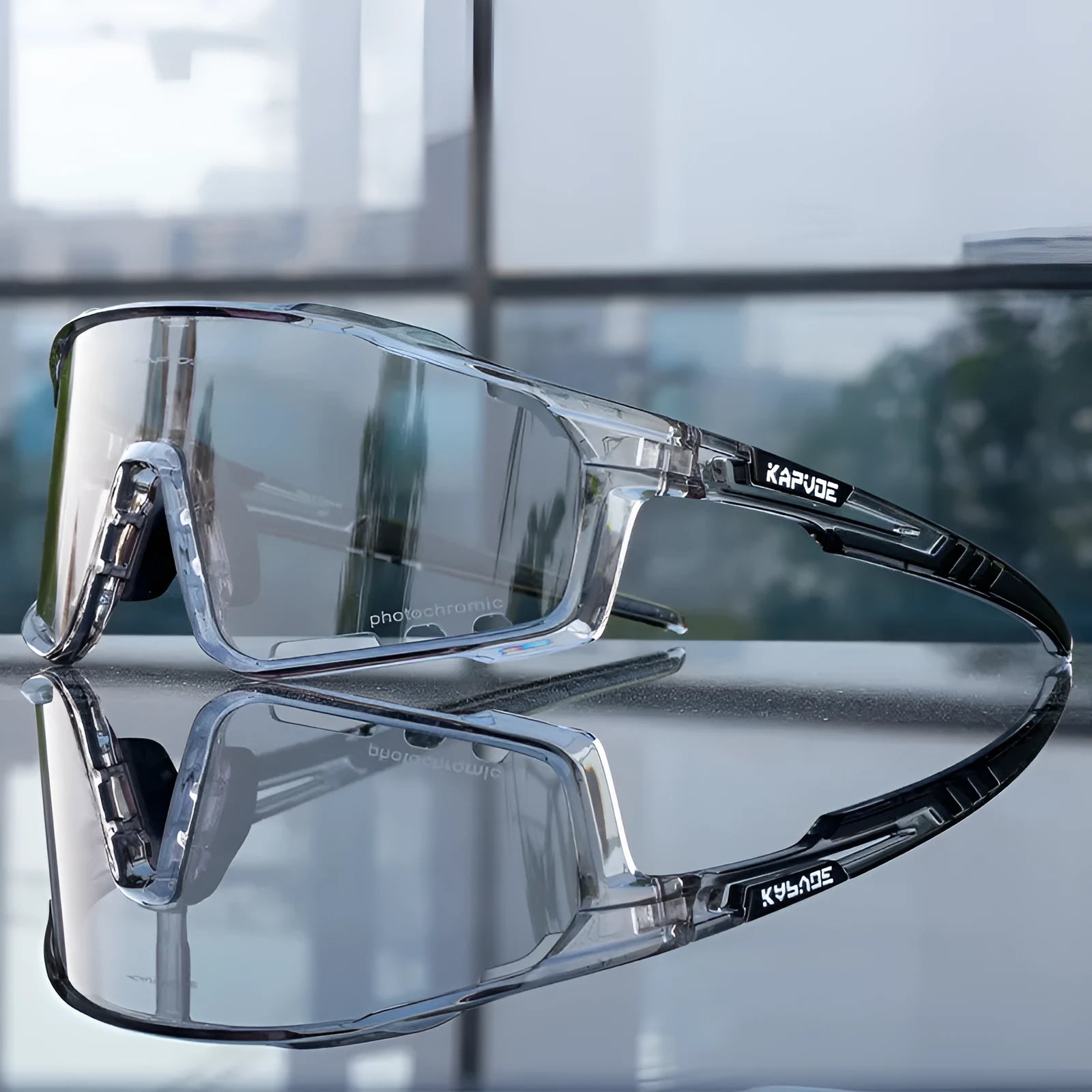 Unisex semi-rimless cycling sports goggles with a photochromic lens and TR90 frame on a solid colour background.