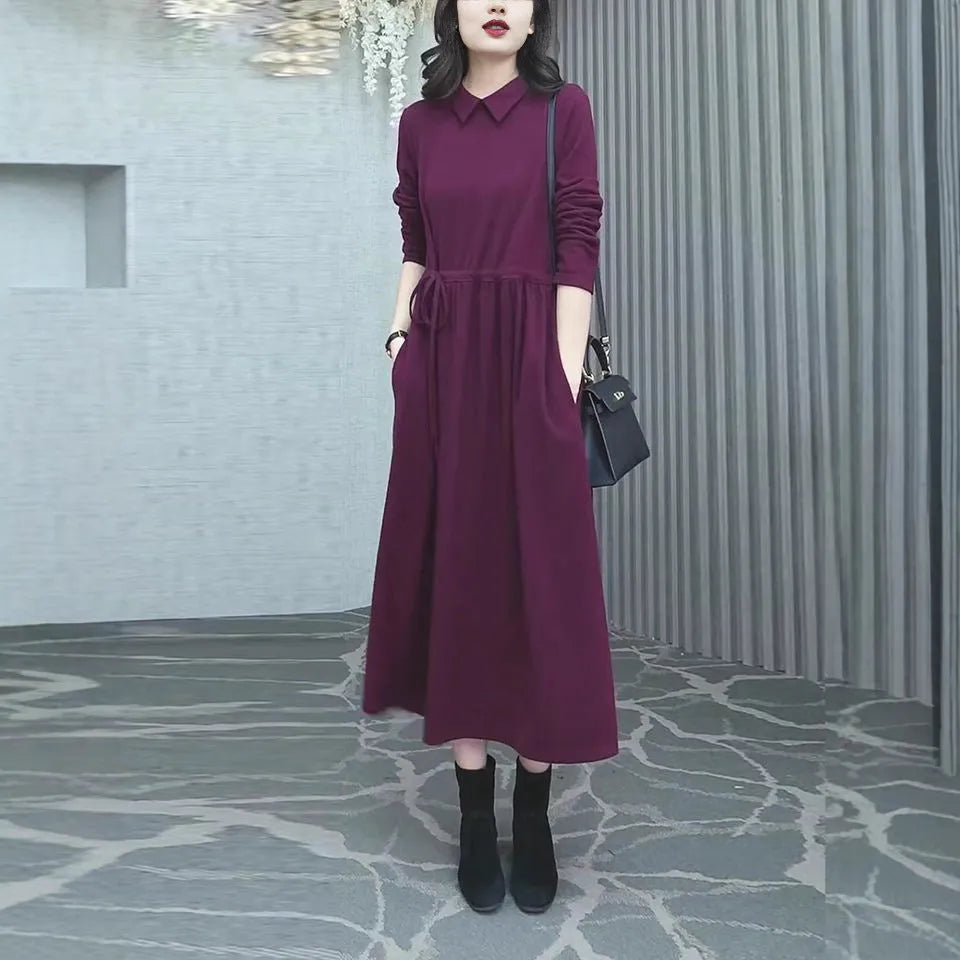 A purplish red plus size long dress with long sleeves for women in autumn and winter.