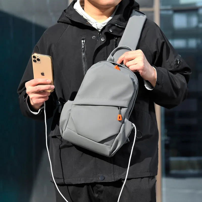 Mens casual single shoulder crossbody bag in polyester material, shown in black and grey colour options