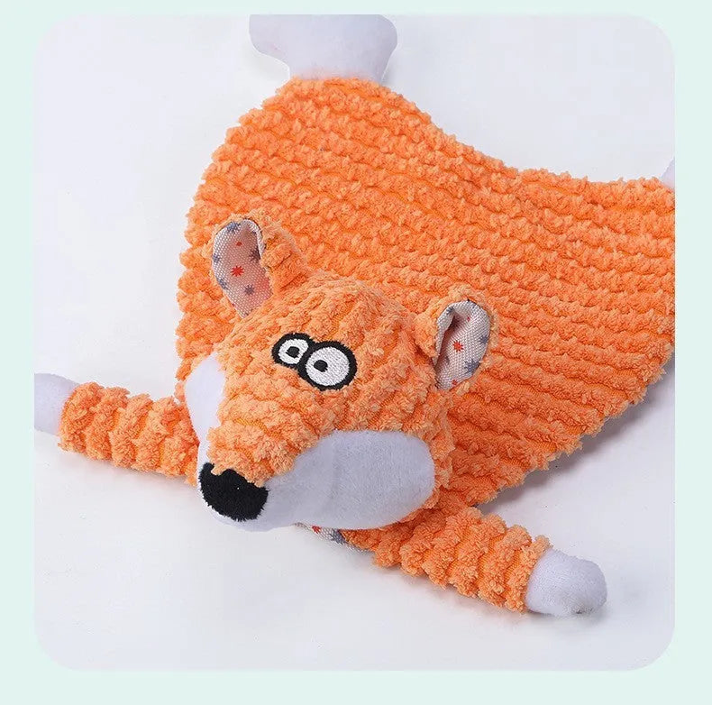 Brown, gray and orange plush pet toys in fox and elephant shapes with velvet texture