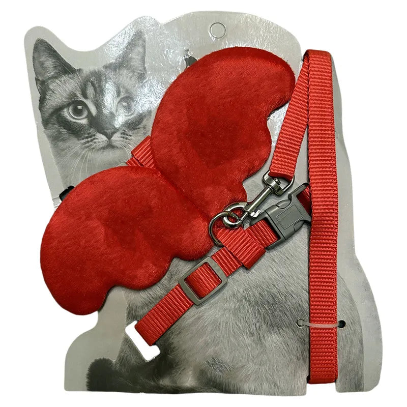 Purple pet chest strap for a small dog, held in a person's hand.