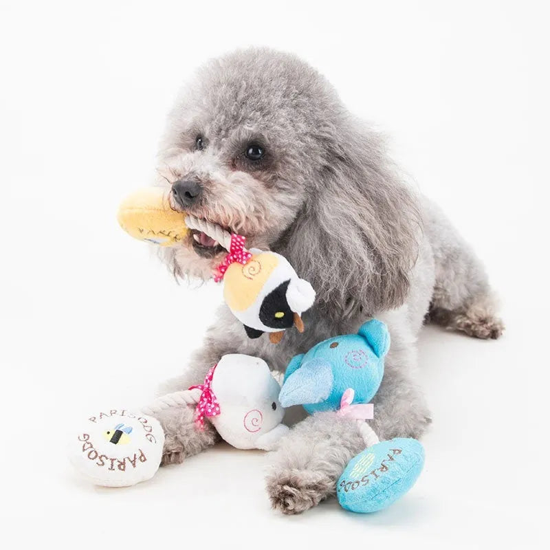 Plush animal dog toy with cotton rope and squeaker in frog, elephant, cow, and bear designs.