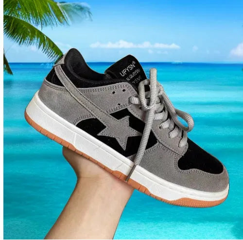 Lightweight lace-up low top sneakers with polyurethane upper and cloth lining in white and black colourway