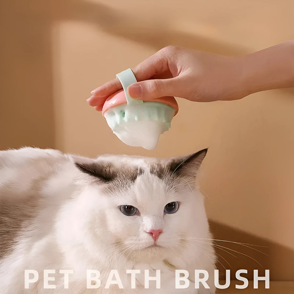 Blue silicone pet bathing brush with soft nubs for massaging and cleaning cats or dogs.