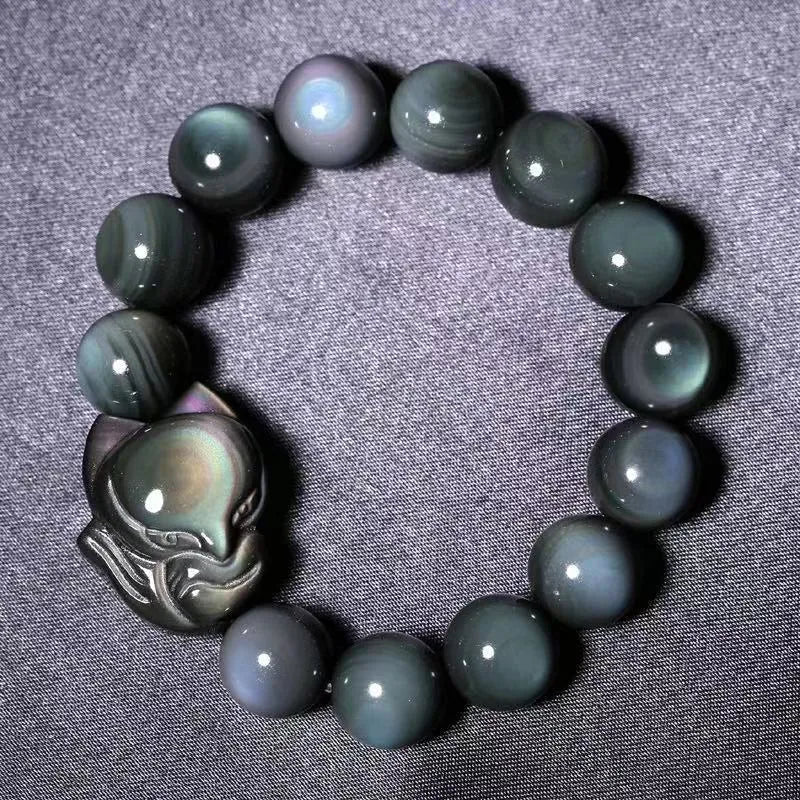 Obsidian fox carved couple bracelet showing animal detail and bead sizing options
