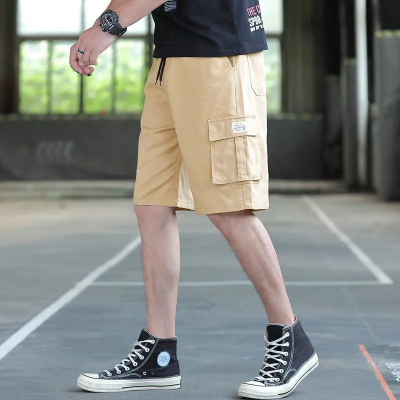 Men's loose fit Korean style casual trousers in camouflage colour, showing relaxed fit and lightweight fabric.