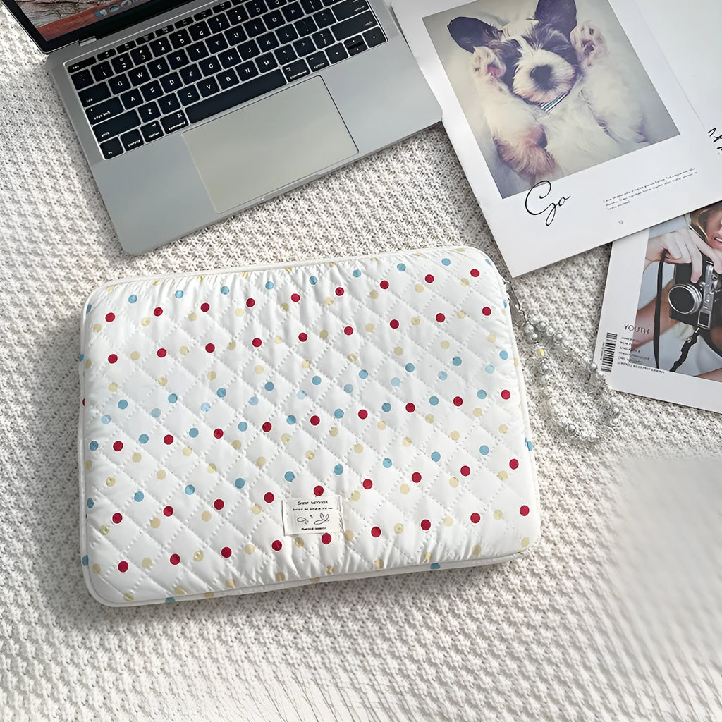 Women's polka dot laptop bag in breathable polyester with size options for computer protection